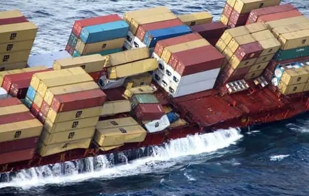 Shipping containers float in sea
