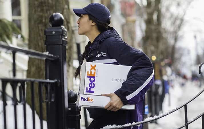 Women carrying a package